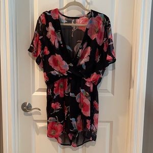 Floral Romper-worn once, fits more like a M.